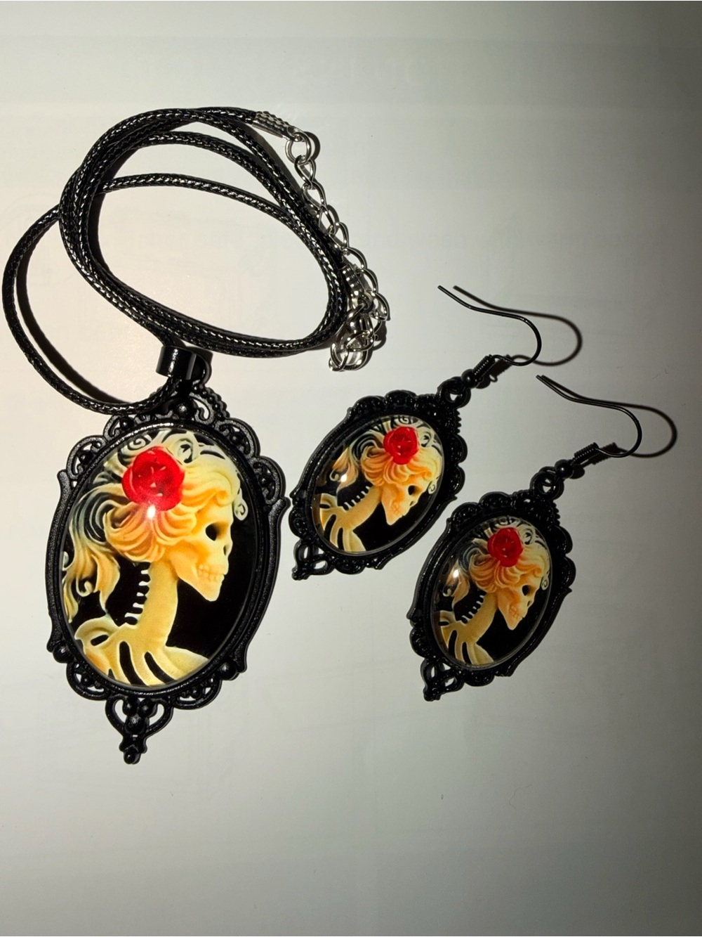 Black Cameo Skull Pendant Necklace and Earrings Set with Red Rose Accent